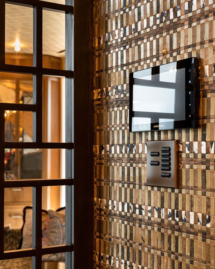 Crestron whole-home touch panel with Lutron keypad